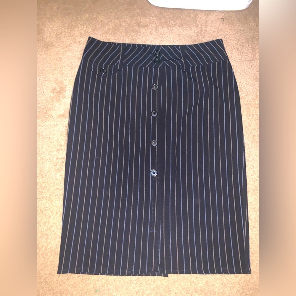 Women’s black pencil skirt with light blue and tan stripes. Size small
